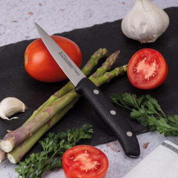 Cuchillo mondador de 9 cm 3 Claveles Domvs 950 cortando espárragos