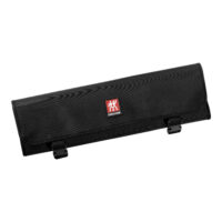 Manta enrollable Zwilling con 7 compartimentos en nylon negro cerrada mostrando diseño compacto enrollable profesional